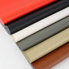Tejido Vinil para tapicería, 100% PVC, 1.40m de  ancho, liso colores surtidos.